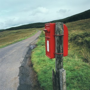 A rural postbox on a country road side